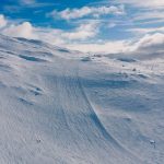 snow covered mountain under blue sky during daytime